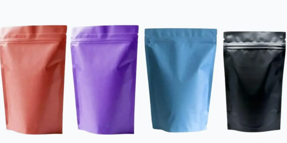 Stand up pouches with zip lock and degassing valve, custom printed by VLM Poliplast